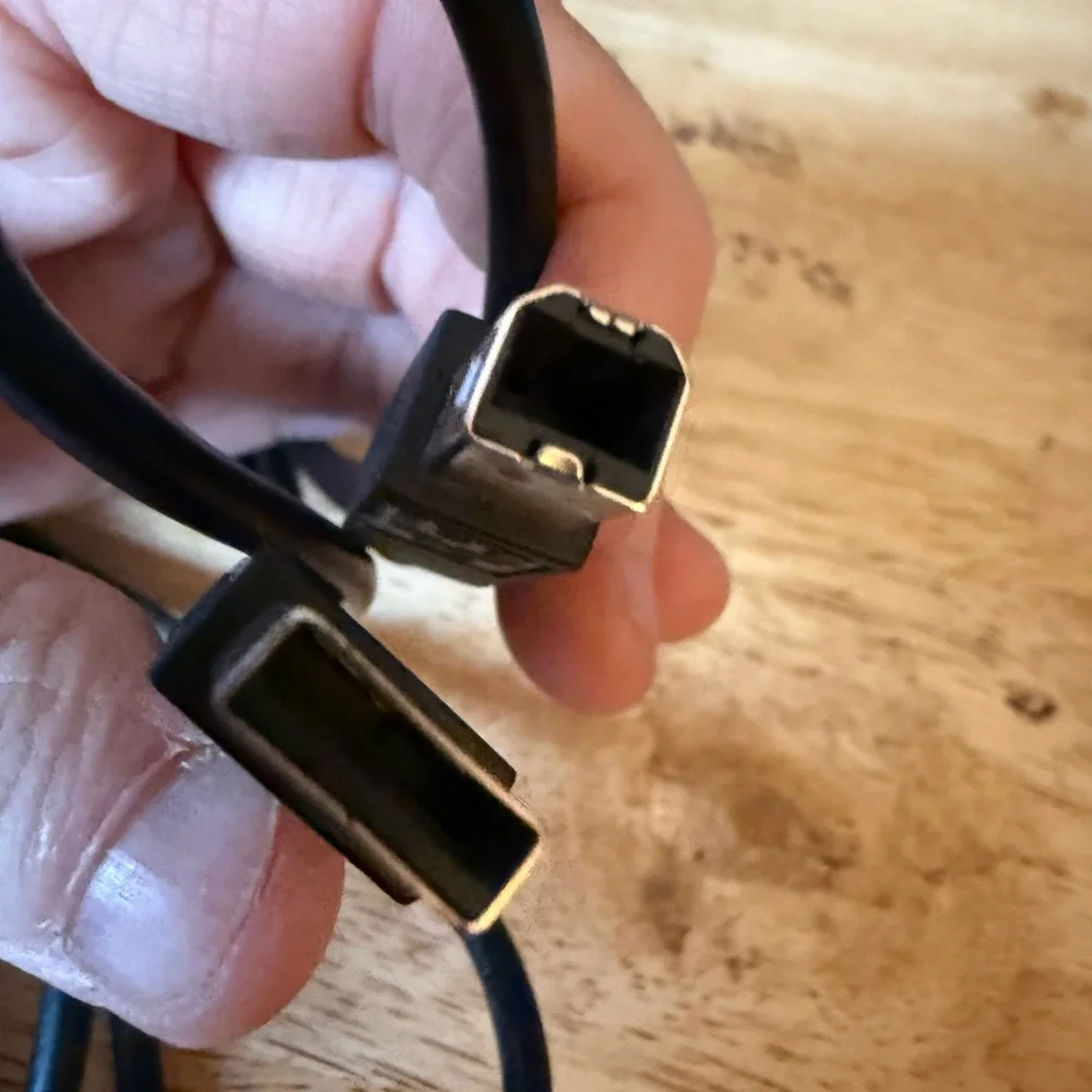 Set of Three Black Computer Cables.
